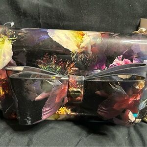 Betsey Johnson Multicolor Floral Clutch with Black Bow. Comes with card holder